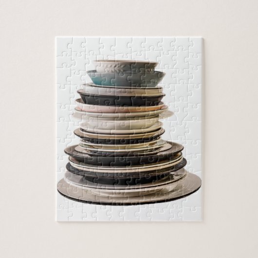 Puzzle d'une pile de plaques. (Vertical)