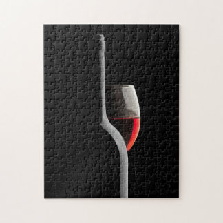 Puzzle Elegant Red Wine Glass & Bottle. Black Background