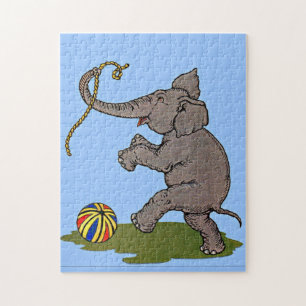 Puzzle éléphant heureux jouant avec la corde et le ballon