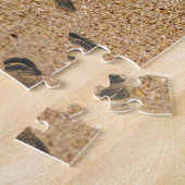 Puzzle Empreintes de pas dans le sable (Côté)