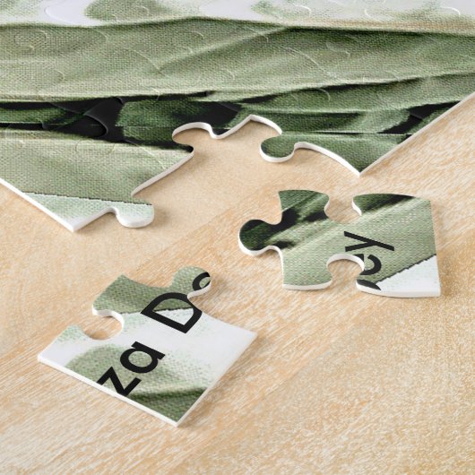 Puzzle en plume grise (Côté)
