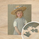 Puzzle Enfant dans un Casquette de paille | Mary Cassatt<br><div class="desc">Child in a Straw Casquette (1886) de l'impressionniste américaine Mary Cassatt. L'oeuvre originale est une peinture à l'huile sur toile représentant un portrait d'une jeune fille dans un casquette surdimensionné en paille, portant une toile gris clair. L'expression sérieuse sur le visage de la fille distingue ce tableau des autres portraits...</div>