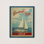 Puzzle Essex Vintage voyage de voilier Connecticut<br><div class="desc">Ce Salutations from Essex Connecticut design nautique de voyage vintage comprend un bateau naviguant sur l'eau avec des mouettes et un ciel bleu rempli de somptueux nuages blancs bouffants.</div>