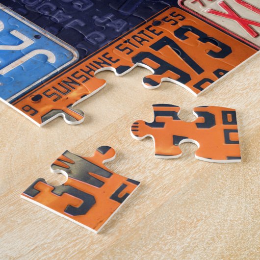 Puzzle Explorez le collage d'art de la plaque de licence  (Côté)