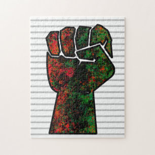 Puzzle fierté noire drapeau rouge vert poing panafricain