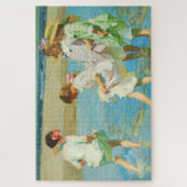Puzzle Filles marchant dans l'eau sur une plage côtière (Vertical)