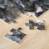 Puzzle Fleurs sauvages de Viola poussant à partir d'un mu (Côté)