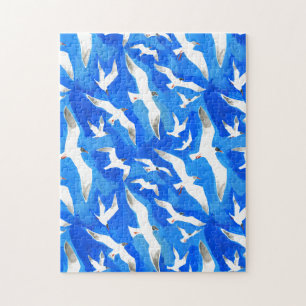 Puzzle Flying seagulls on sky blue