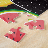 Puzzle Fruits tropicaux colorés, fond noir. (Côté)