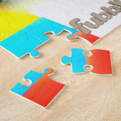 Puzzle Fubby est en discothèque, en train de profiter de (Côté)