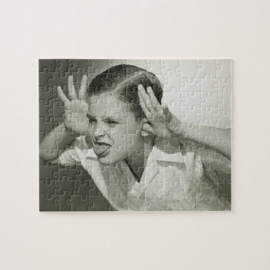 Puzzle Garçon faisant le visage (Horizontal)
