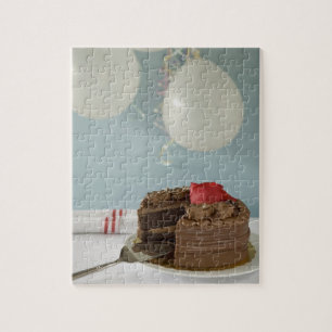 Puzzle Gâteau au chocolat avec tranche manquante sur la t