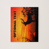 Puzzle Grand mâle silhouetté contre le coucher du soleil (Vertical)