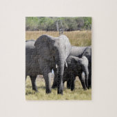 Puzzle Groupe d'éléphants africains devant le trou d'eau (Vertical)