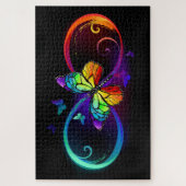 Puzzle Infini vibrant avec papillon arc-en-ciel sur noir (Vertical)