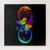 Puzzle Infini vibrant avec papillon arc-en-ciel sur noir (Vertical)