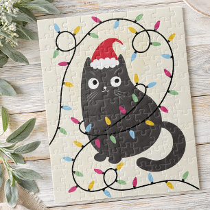Puzzle Joli chat avec un chapeau de Père Noël et lumières