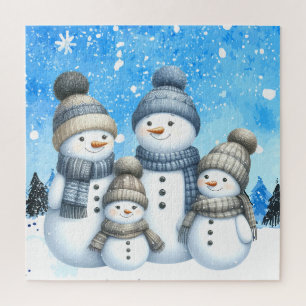 Puzzle Jolie famille des bonhomme de neige dans la neige