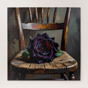 Puzzle Jolie rose noire sur une chaise rustique pour la S