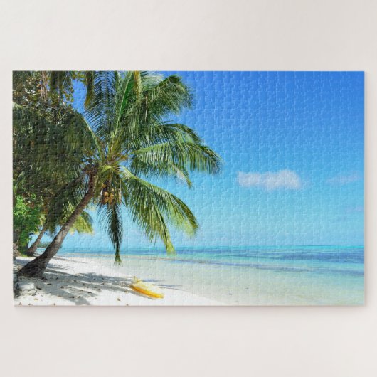 Puzzle Kayak jaune sur une plage blanche avec la paume (Horizontal)