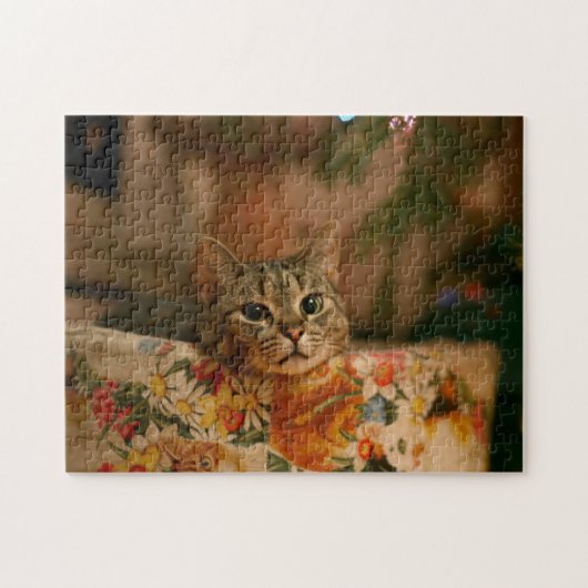 Puzzle Kitten peeking behind the Christmas tree (Horizontal)