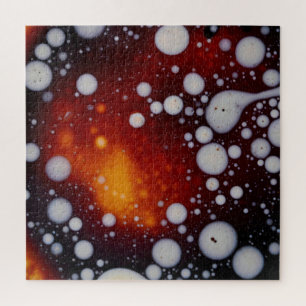 Puzzle La naissance des étoiles dans un liquide Abstrait