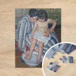 Puzzle Le bain de l'enfant | Mary Cassatt<br><div class="desc">The Child's Bath (1893) de l'impressionniste américaine Mary Cassatt. L'oeuvre originale est une peinture à l'huile sur toile représentant un portrait d'une mère donnant un bain à son jeune enfant. Utilisez les outils de conception pour ajouter du texte personnalisé ou personnaliser l'image.</div>