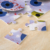 Puzzle le collecteur de globe oculaire (Côté)