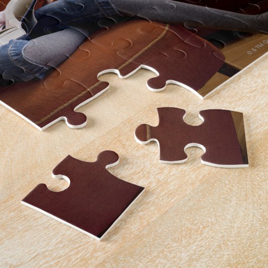 Puzzle Lecture de fille par la bibliothèque (Côté)