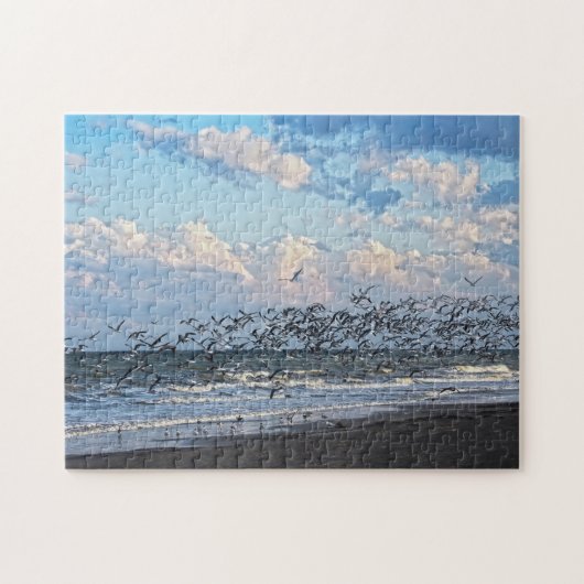 Puzzle Les amateurs de ski noir décolle sur la plage de C (Horizontal)