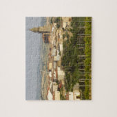 Puzzle Les rangées de vignes au premier plan encadrent le (Vertical)