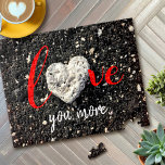 Puzzle Love You More Hawaii Beach Coral Heart Rock Photo<br><div class="desc">"Je t'aime plus". J'ai de la chance d'avoir repéré cette roche corallienne en forme de coeur, en marchant sur cette plage de sable noir de Big Island Hawaiian en fin d'après-midi. Un merveilleux rappel de l'amour chaque fois que vous travaillez sur cette étonnante, graphique, puzzle photo. Vous pouvez même remplacer...</div>