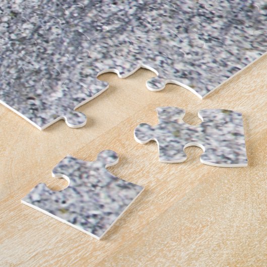 Puzzle Magnifique écureuil en pierre noire sur le rocher (Côté)