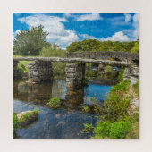 Puzzle Medieval clapper bridge over river in Dartmoor UK (Vertical)