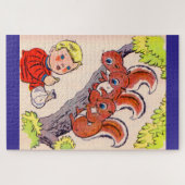 Puzzle mignon petit garçon nourrit de mignons petits écur (Horizontal)
