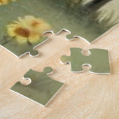 Puzzle Mignonne poney brun dans le champ floral (Côté)