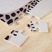 Puzzle motif avec des éléphants et des girafes mignons gé (Côté)