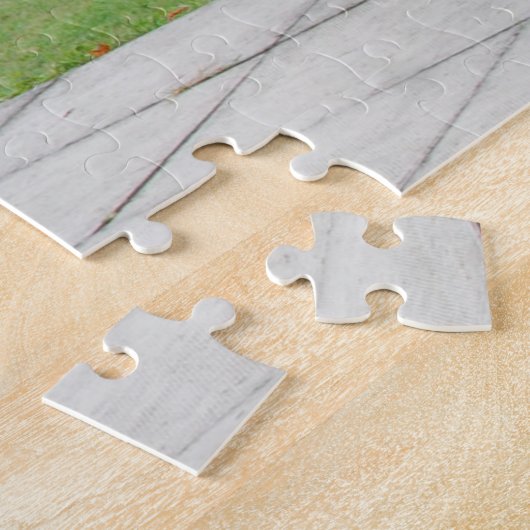 Puzzle Motocyclette de Suzuki devant la statue de (Côté)