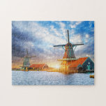 Puzzle Moulins à vent néerlandais Coucher de soleil nuage<br><div class="desc">Ce superbe puzzle de voyage pittoresque présente un ciel nuageux et lugubre avec les moulins à vent hollandais sur les canaux près de Rotterdam dans la Pays-Bas.</div>