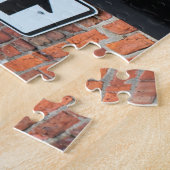 Puzzle Mur en briques rouges et panneau à sens unique (Côté)