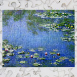 Puzzle Nénuphars de Claude Monet, Art Vintage<br><div class="desc">Nénuphars by Claude Monet est une vintage impressionnisme de peinture de la nature d'art fine mettant en scène des nénuphars dans un étang dans le jardin de Monet chez lui à Giverny, France. Une journée ensoleillée de printemps ou d'été avec le ciel bleu vif se reflétant dans l'étang. Claude Monet...</div>