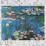 Puzzle Nénuphars de Claude Monet, Impressionnisme Vintage<br><div class="desc">Nénuphar (1914) de Claude Monet est une peinture de nature impressionniste vintage. Une des nombreuses variations de peintures florales de nénuphars que Monet peint par l'étang dans son jardin fleuri à Giverny, France. À propos de l'artiste : Claude Monet (1840-1926) est un fondateur du mouvement de peinture impressionniste française, dont...</div>