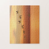 Puzzle Oies du Canada en vol au coucher du soleil (Vertical)