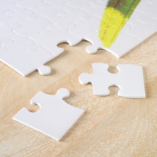 Puzzle Oiseau vert ressemblant à un perroquet perché sur  (Côté)