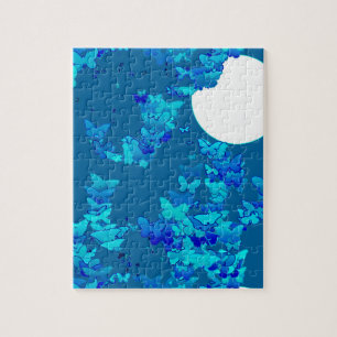 Puzzle Papillons contre ciel bleu nuit, paysage lunaire