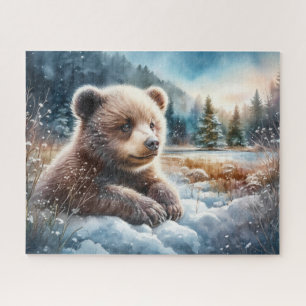 Puzzle Petit ourson brun dans la neige hivernale et les p