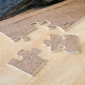 Puzzle Phare sur rochers avec réflexion océanique (Côté)