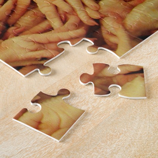 Puzzle Pieds de poulet cru (Côté)