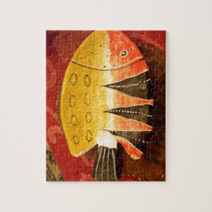Puzzle poisson plat jaune et rouge avec rayures noires.jp