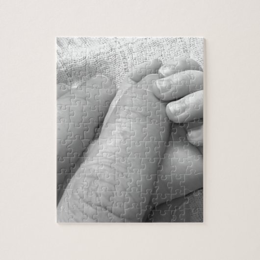 Puzzle Prise de mains de doigts de main de bébé (Vertical)